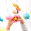 Körhinta a kiságy fölé világító vetítővel  Baby Mix szürke