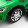 Zenélő bébitaxi vezetőrúddal Baby Mix RACER zöld