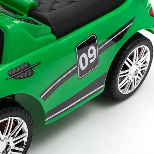Zenélő bébitaxi vezetőrúddal Baby Mix RACER zöld