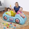 Gyermek felfújható autó Fisher-Price labdákkal 119x79x51 cm