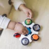 BABY EINSTEIN Kontrasztos Érzékszervi játék Curiosity Clutch™ 3hó+